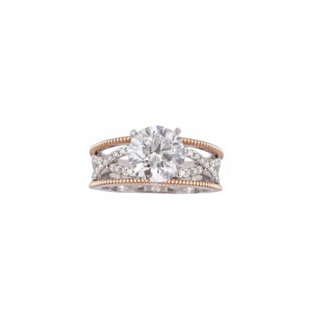 Woven Radiance – Dual-Tone Gold Solitaire Ring with Criss-Cross Pavé Band